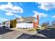 View of the end unit townhome showing white fence and some landscaping at 1331 Ashville Dr, Westfield, IN 46074