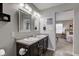 Double vanity bathroom with view of bedroom at 15317 Black Gold Ct, Noblesville, IN 46060