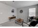 Bright bonus room with seating area and stylish decor at 15317 Black Gold Ct, Noblesville, IN 46060