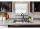 Kitchen sink with a modern faucet and granite countertops at 15317 Black Gold Ct, Noblesville, IN 46060