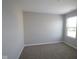 Well-lit bedroom with grey walls and carpet at 16775 Cheddar Dr, Noblesville, IN 46060