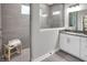 Elegant bathroom with walk-in shower, double vanity, and modern fixtures at 19381 Sumrall Pl, Westfield, IN 46074