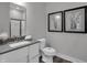 Clean bathroom with gray countertop and modern fixtures at 19381 Sumrall Pl, Westfield, IN 46074