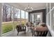 Spacious screened porch overlooking a backyard and treeline at 19381 Sumrall Pl, Westfield, IN 46074