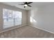 Well-lit bedroom with neutral walls and carpet flooring at 2233 Historic Oaks Blvd, Indianapolis, IN 46214