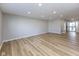 Spacious living room with laminate flooring at 2233 Historic Oaks Blvd, Indianapolis, IN 46214