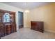 Dining room with tiled floor, chandelier, and built-in hutch at 345 E Hickory Ln, Indianapolis, IN 46227