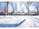 Brick ranch home with snow-covered yard at 345 E Hickory Ln, Indianapolis, IN 46227