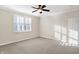 Bright bedroom with neutral walls, carpeting, ceiling fan, and plantation shutters at 3457 Heathcliff Ct, Westfield, IN 46074