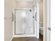 Walk-in shower with grab bars and glass enclosure at 3457 Heathcliff Ct, Westfield, IN 46074