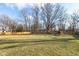 Spacious backyard with grassy lawn and playset at 5119 E 71St St, Indianapolis, IN 46220