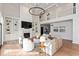 Bright living room with high ceilings, built-in shelves, and hardwood floors at 5119 E 71St St, Indianapolis, IN 46220