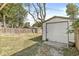 Backyard with detached garage and fenced yard at 5137 Ralston Ave, Indianapolis, IN 46205