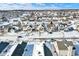 Aerial view of a residential neighborhood covered in snow at 5632 Wild Horse Dr, Indianapolis, IN 46239