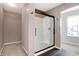 Modern bathroom with a glass shower door and updated vanity at 5632 Wild Horse Dr, Indianapolis, IN 46239