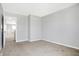 Bright bedroom with neutral walls and carpet, near hallway at 5632 Wild Horse Dr, Indianapolis, IN 46239