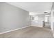 Spacious hallway with carpeted floor and access to bedrooms at 5632 Wild Horse Dr, Indianapolis, IN 46239