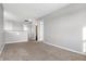 Bright hallway with neutral walls and carpeted floor at 5632 Wild Horse Dr, Indianapolis, IN 46239