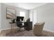 Bright home office featuring a modern desk, comfortable chair, and stylish decor at 5632 Wild Horse Dr, Indianapolis, IN 46239