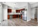 Modern kitchen with stainless steel appliances and wood cabinets at 5632 Wild Horse Dr, Indianapolis, IN 46239