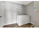 Laundry room with washer, dryer and shelving at 5632 Wild Horse Dr, Indianapolis, IN 46239