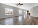 Bright living room featuring hardwood floors and a view of the kitchen at 5632 Wild Horse Dr, Indianapolis, IN 46239