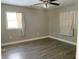 Bedroom with gray walls and wood floor at 566 E 500 S, Anderson, IN 46013