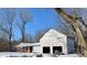 Brick ranch home with attached garage under renovation, winter scene at 566 E 500 S, Anderson, IN 46013