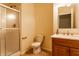 Bathroom featuring a glass shower, sink, and a stylish vanity with storage at 5838 W Bayfield Dr, McCordsville, IN 46055