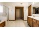 Bright bathroom featuring a tiled floor, double sink vanity, separate shower and tub at 5838 W Bayfield Dr, McCordsville, IN 46055