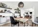 Bright home office with wood desk and built-in shelves at 5845 Sunstone Rd, Indianapolis, IN 46239