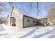 Tan house exterior with snow-covered yard at 6459 Schmus Ct, Indianapolis, IN 46268