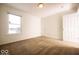 Well-lit bedroom featuring carpet and a window at 6663 Trailside Dr, Avon, IN 46123