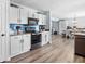 Bright kitchen featuring stainless steel appliances and ample cabinet space at 793 Hollowood Ln, Avon, IN 46123