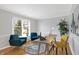 Bright home office with hardwood floors, stylish furnishings, and natural light at 9275 Eastwind Dr, Indianapolis, IN 46256