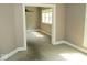 Bright living room featuring neutral walls, ample natural light, and a spacious open floor plan at 1138 W 33Rd St, Indianapolis, IN 46208