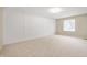 Empty bedroom with neutral wall and carpet at 15236 Countfleet Ct, Carmel, IN 46032