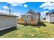 House exterior showcasing backyard deck and shed at 1631 Brier Pl, Indianapolis, IN 46203