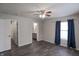 Bright bedroom with ensuite bathroom and ceiling fan at 1685 Juniper Dr, Columbus, IN 47201