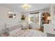 Charming Bedroom featuring a crib and floral rug at 17895 Hollow Brook Ct, Noblesville, IN 46062