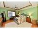 Main bedroom with wood flooring, large windows, and plenty of light at 2068 Saunders Field Dr, Avon, IN 46123