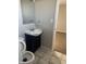 Bathroom with white vanity, toilet, and tile flooring at 2450 Morning Star Dr, Indianapolis, IN 46229