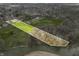 Wide aerial view featuring property boundaries, lush greenery, mature trees, and access to the river at 2940 Washington St, Columbus, IN 47201