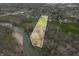 Aerial view showcasing property near river, defined by a boundary, blending lush greenery with river frontage at 2940 Washington St, Columbus, IN 47201