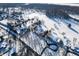 Aerial view of home, snowy landscape, and river at 2940 Washington St, Columbus, IN 47201