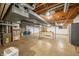 Unfinished basement with high ceilings, HVAC system, and ample storage space at 2940 Washington St, Columbus, IN 47201