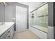 Clean bathroom with a shower/tub combo and gray tile flooring at 2940 Washington St, Columbus, IN 47201