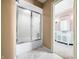Bathroom with shower/tub combo, and a view to another bathroom at 2940 Washington St, Columbus, IN 47201