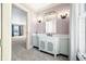Bathroom with updated vanity, marble countertop and large window at 2940 Washington St, Columbus, IN 47201