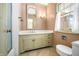 Bathroom with vanity, shower, and classic tile at 2940 Washington St, Columbus, IN 47201